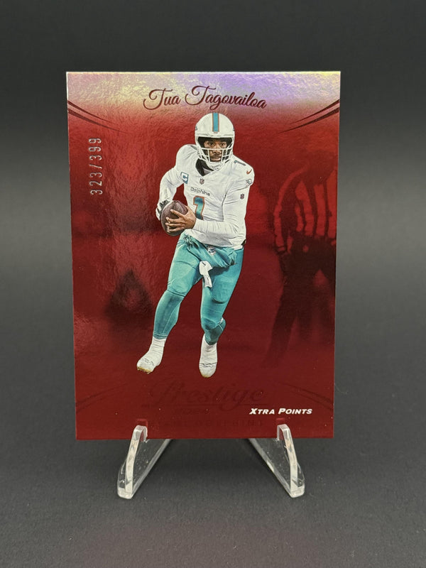 2024 Panini Prestige #182 Tua Tagovailoa Red Premium Xtra Points #323/399