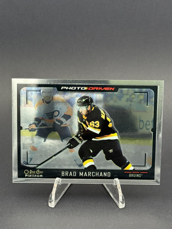2021-22 O-Pee-Chee Platinum #PD-4 Brad Marchand Photo-Driven